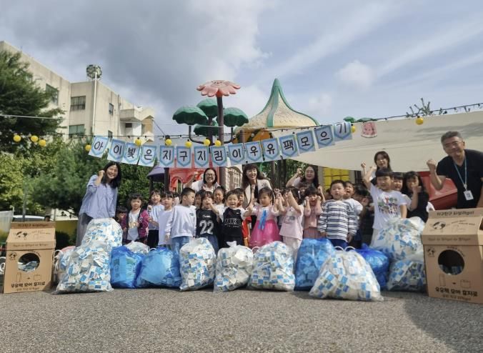 수원시 장안구 연무동 아이빛어린이집, 연무동 행정복지센터에 우유팩 전달